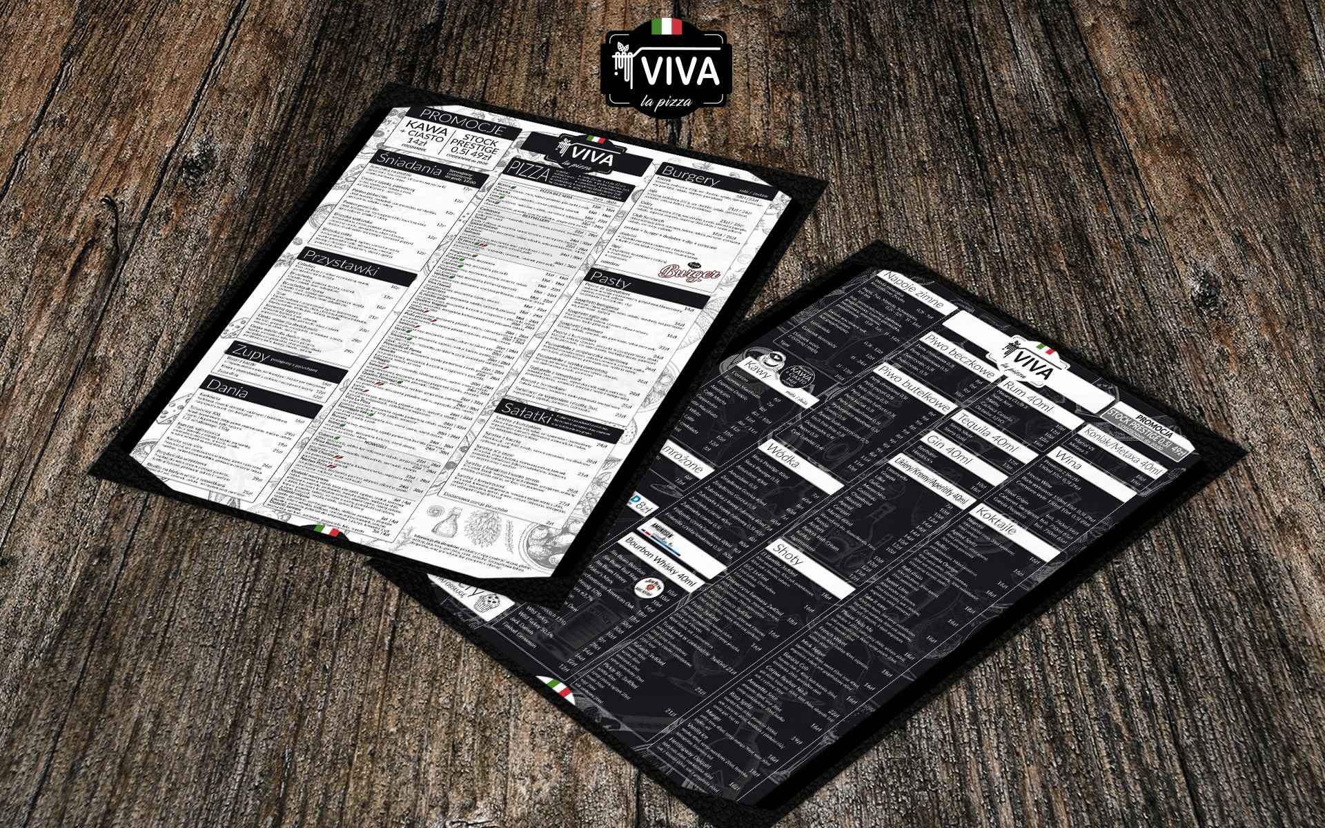 Dwa menu restauracji Viva la pizza ułożone na drewnianym stole, jedno białe z ofertą dań, drugie czarne z ofertą napojów.