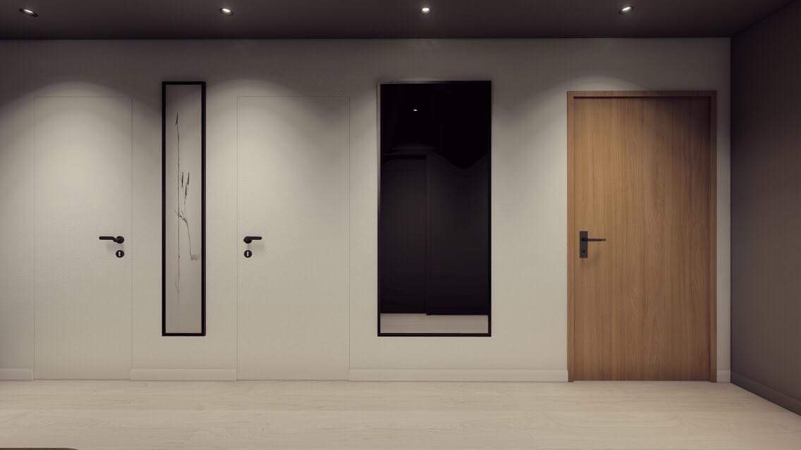 Nowoczesne wnętrze z trzema białymi drzwiami z czarnymi klamkami, czarnym lustrem w ramie i pionowym obrazem w ramie, oświetlone punktowymi lampami sufitowymi.