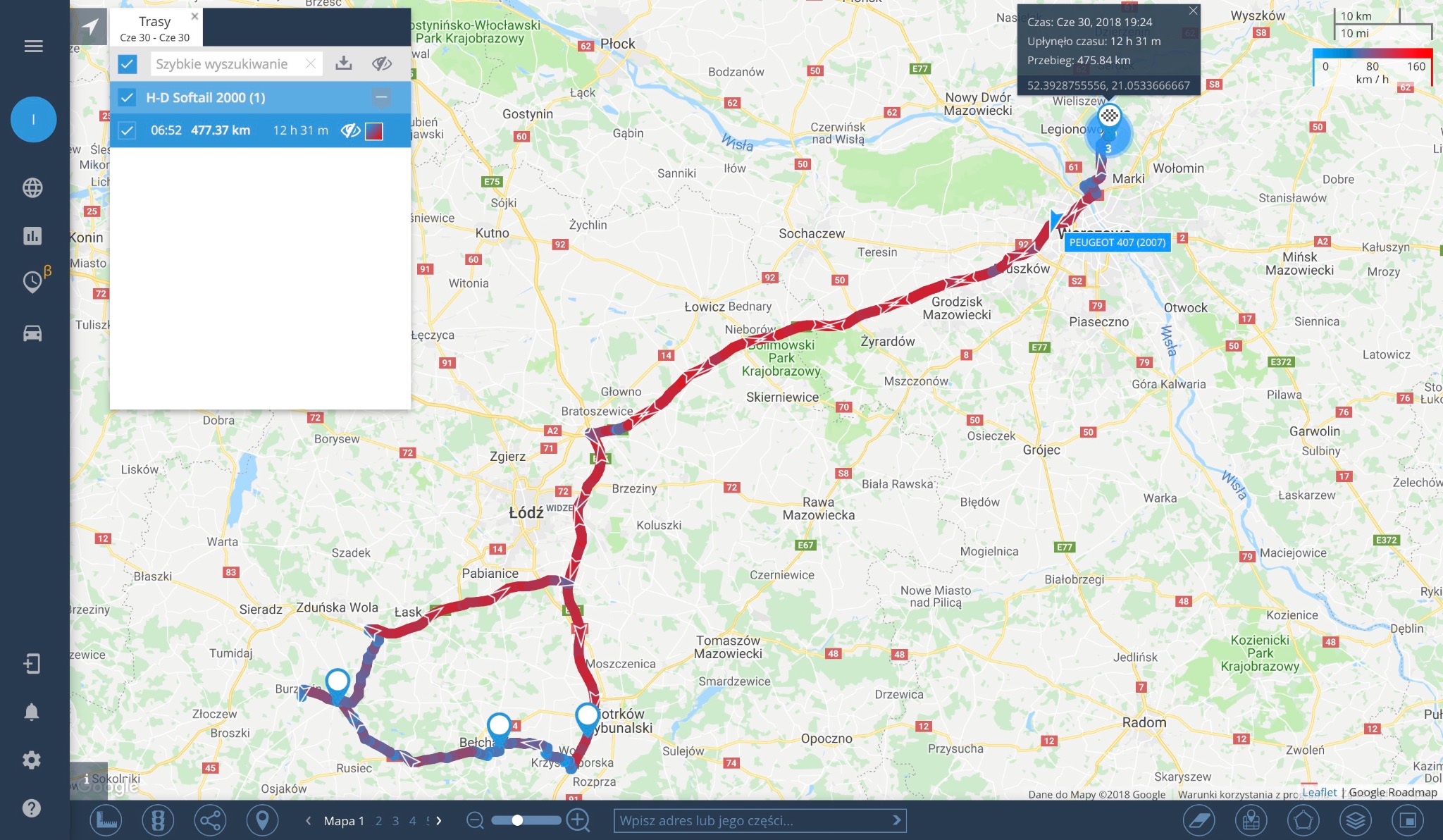 Mapa z zaznaczoną trasą przejazdu pojazdu, widoczne miasta Łódź, Warszawa, Radom, zaznaczony czas przejazdu i przebieg w aplikacji.