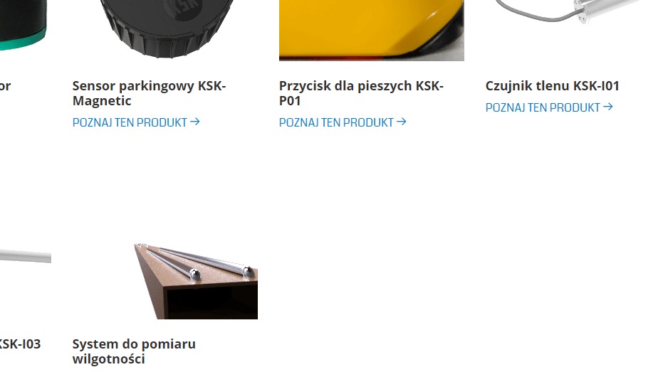 Zbliżenie na system do pomiaru wilgotności, składający się z trzech metalowych prętów umieszczonych na brązowej podstawie.