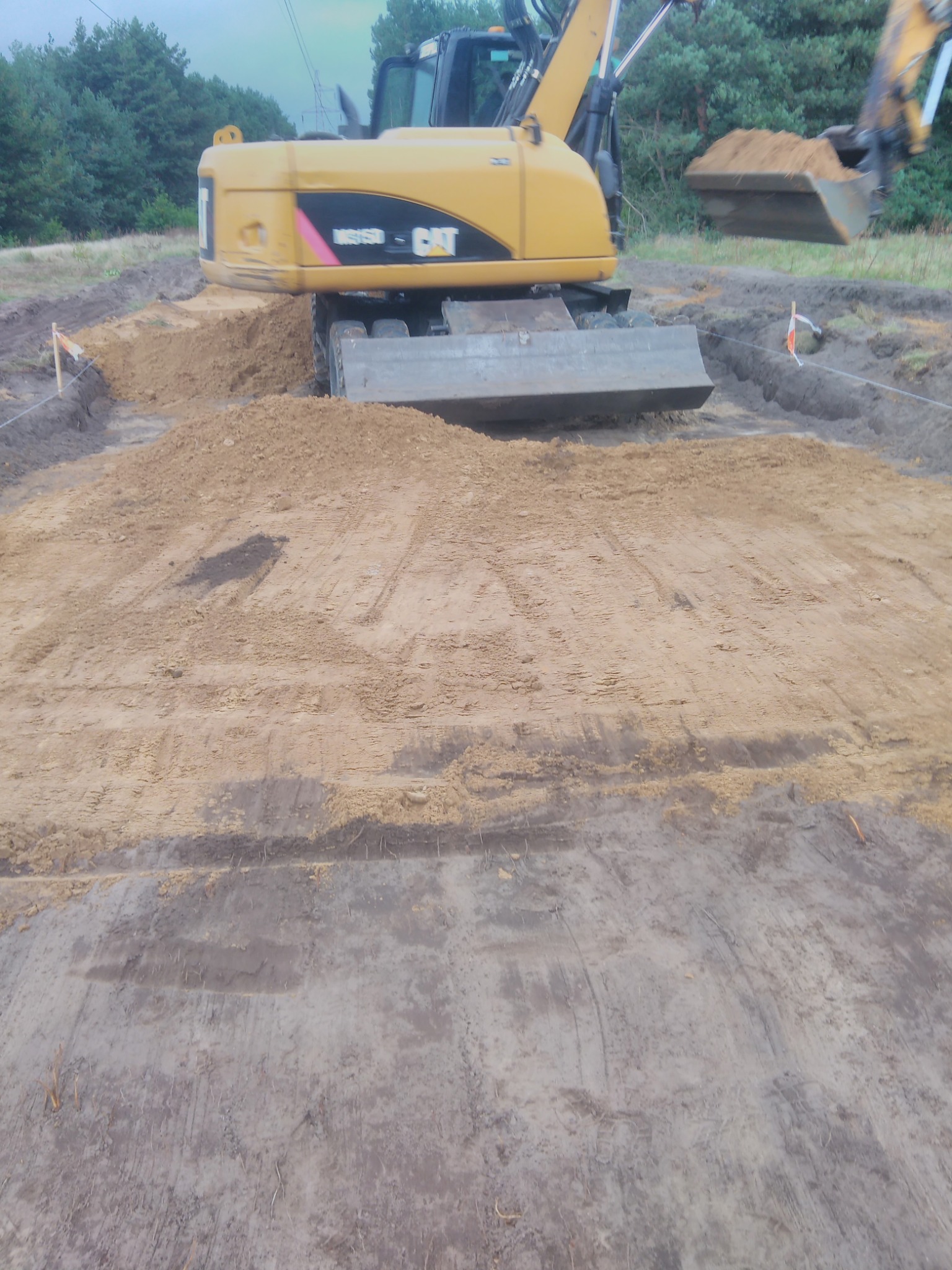 Przygotowanie podbudowy pod drogę z kruszywa