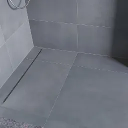 Prysznic z odpływem liniowym zamontowany od podstaw po biały montaż