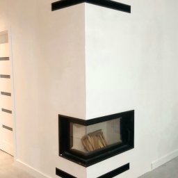 Kominek narożny, minimalistyczny.