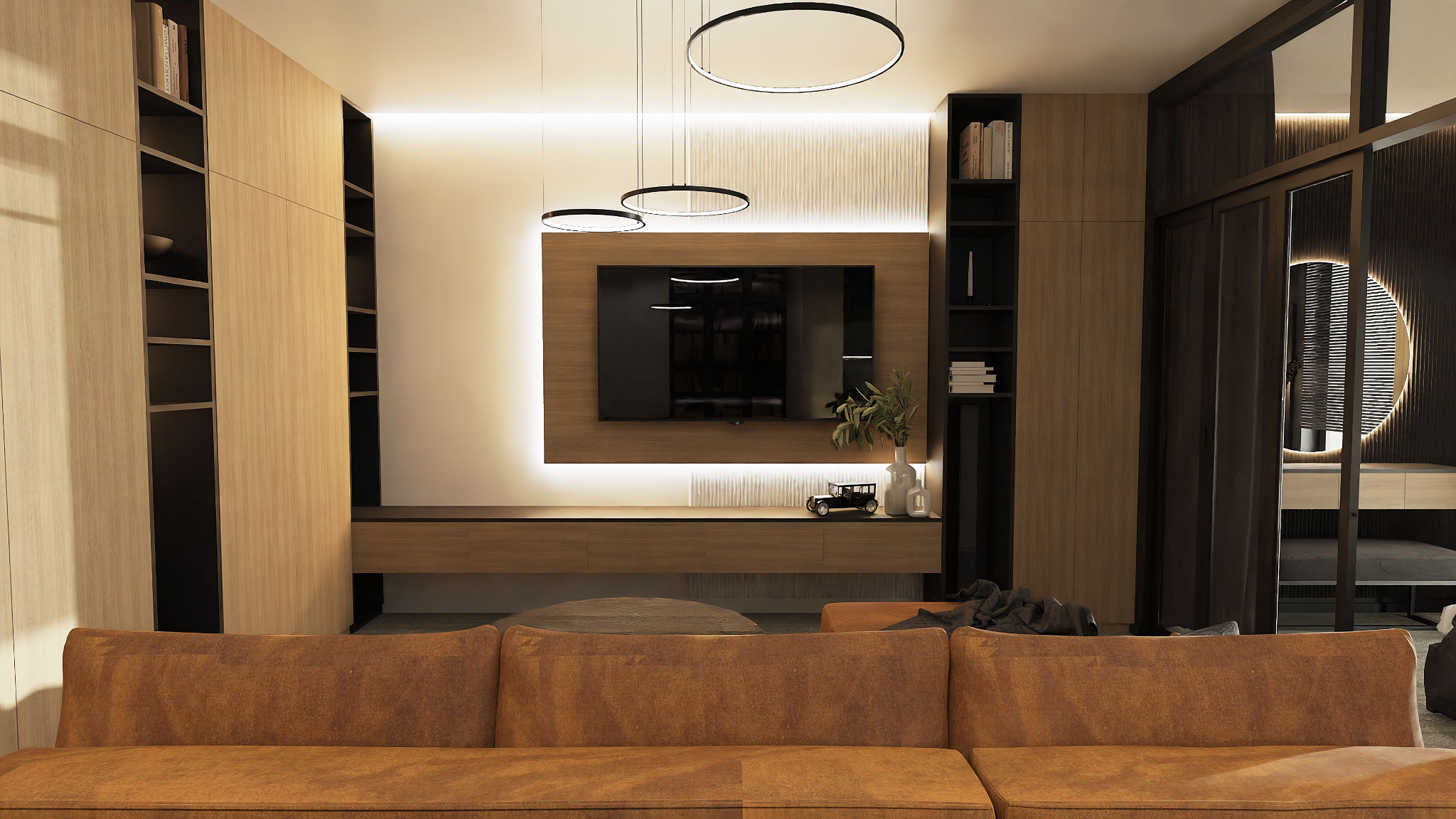 Nowoczesny salon z telewizorem na ścianie, drewnianymi szafkami, okrągłymi lampami wiszącymi i brązową sofą z przodu