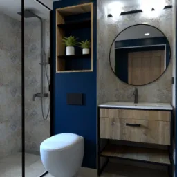 Nowoczesna łazienka z kabiną prysznicową, toaletą, umywalką z szafką z drewnianym frontem oraz okrągłym lustrem podświetlonym lampami, akcentowana niebieską ścianą i roślinami w półce.