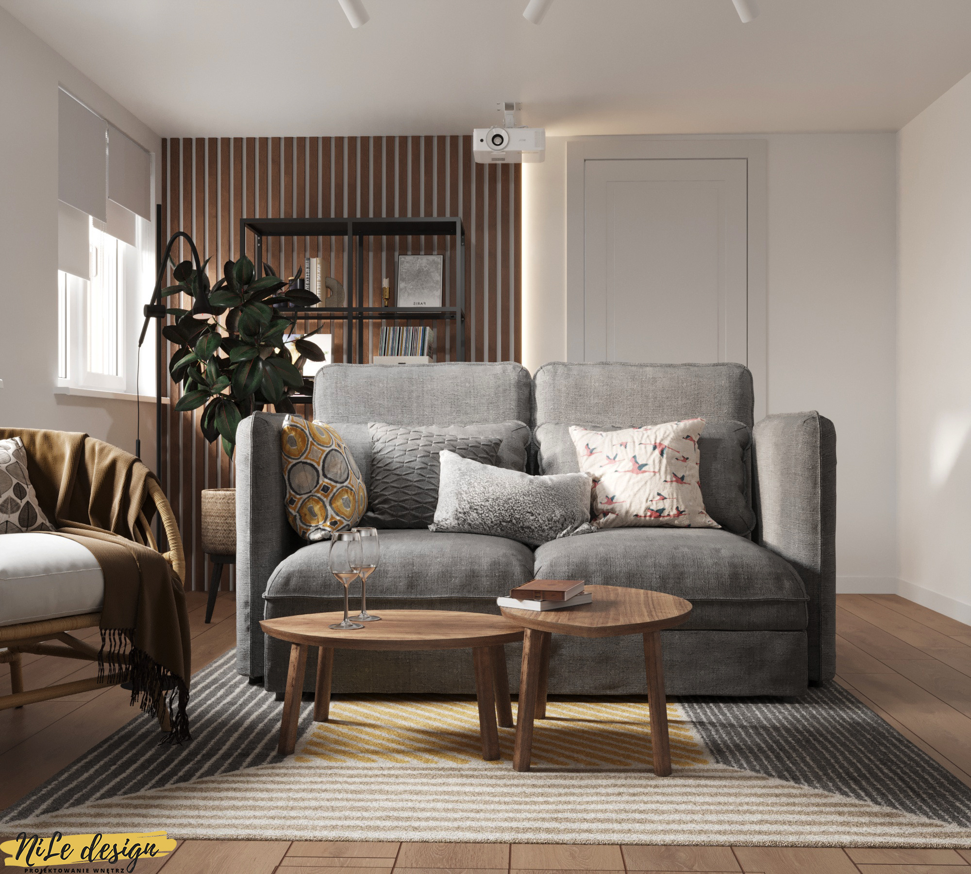 Nowoczesny salon z szarą sofą, drewnianymi stolikami kawowymi, wzorzystym dywanem i ścianą z drewnianymi panelami. Na suficie zamontowany projektor.
