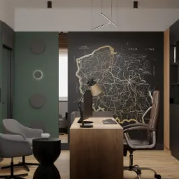 Nowoczesne biuro z mapą Polski na ścianie, drewniane biurko z lampką, szare fotele klubowe i czarne regały.