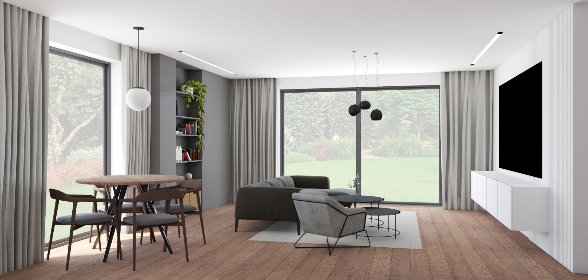 Jasny salon w domu jednorodzinnym z drewnianą podłogą, szarą sofą, okrągłym stołem z krzesłami, telewizorem na ścianie z białymi szafkami i dużymi oknami z widokiem na ogród.