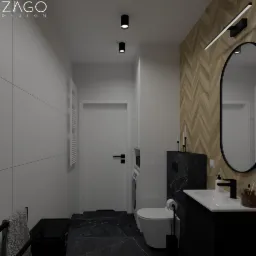 Wizualizacja łazienki z czarnymi akcentami: marmurowa podłoga i blat, umywalka nablatowa z czarną baterią, owalne lustro z podświetleniem LED, ściana wykończona drewnem ułożonym w jodełkę, toaleta,...