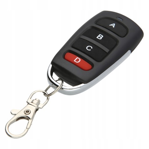 Czarny pilot do bramy z czterema przyciskami (A, B, C, D) i metalowym brelokiem, widok z góry.