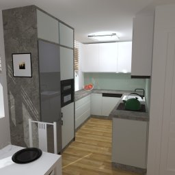 Meble-Pol sp. z o.o. - Wizualizacja nowoczesnej kuchni z białymi frontami, szarymi blatami i kamienną kolumną obok okna z żaluzjami, z widocznym fragmentem stołu jadalnego z czarnym talerzem.