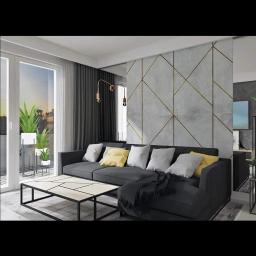 Tilmon Damian Piaseczny - Nowoczesny salon w Oleśnicy z szarą sofą narożną, geometrycznym stolikiem kawowym i ścianą z betonowych paneli z złotymi wstawkami.