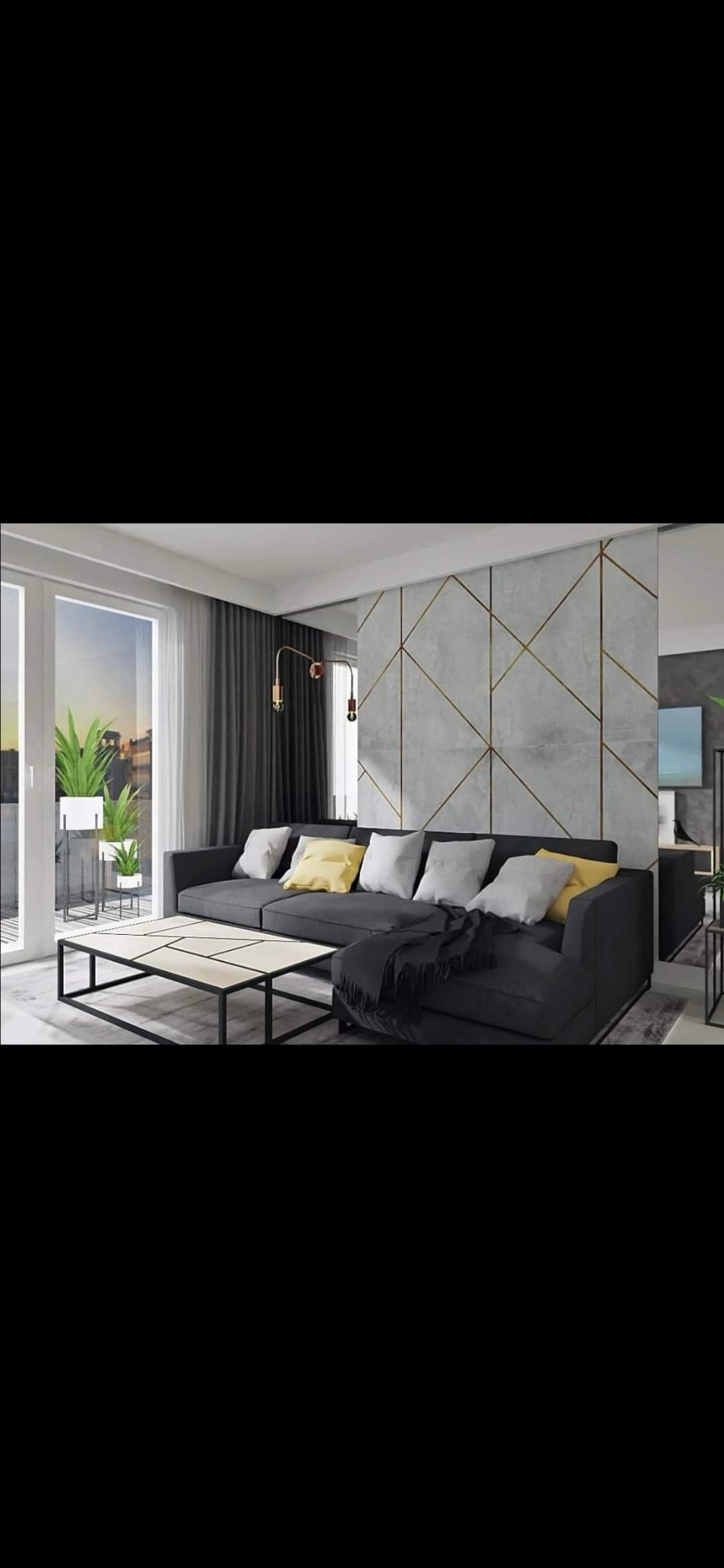 Nowoczesny salon w Oleśnicy z szarą sofą narożną, geometrycznym stolikiem kawowym i ścianą z betonowych paneli z złotymi wstawkami.