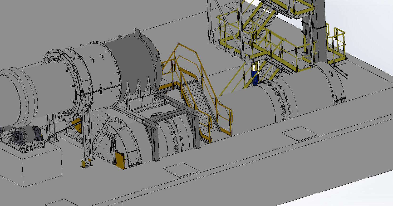 Model 3D instalacji przemysłowej z piecem obrotowym, schodami dostępowymi i elementami konstrukcji stalowej, przedstawiony w szaro-żółtej kolorystyce.