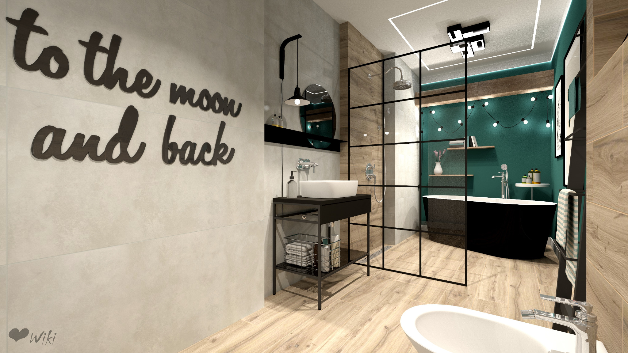 Nowoczesna łazienka z czarną wanną wolnostojącą, umywalką nablatową na czarnym stelażu, kabiną prysznicową typu walk-in z czarnymi profilami i dekoracyjnym napisem 'to the moon and back' na ścianie.