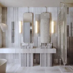 Elegancka łazienka z dwoma umywalkami nablatowymi w paski, podświetlanymi lustrami o zaokrąglonych krawędziach, mozaikową ścianą, kabiną prysznicową w stylu art deco oraz wiszącą lampą z plecionki.