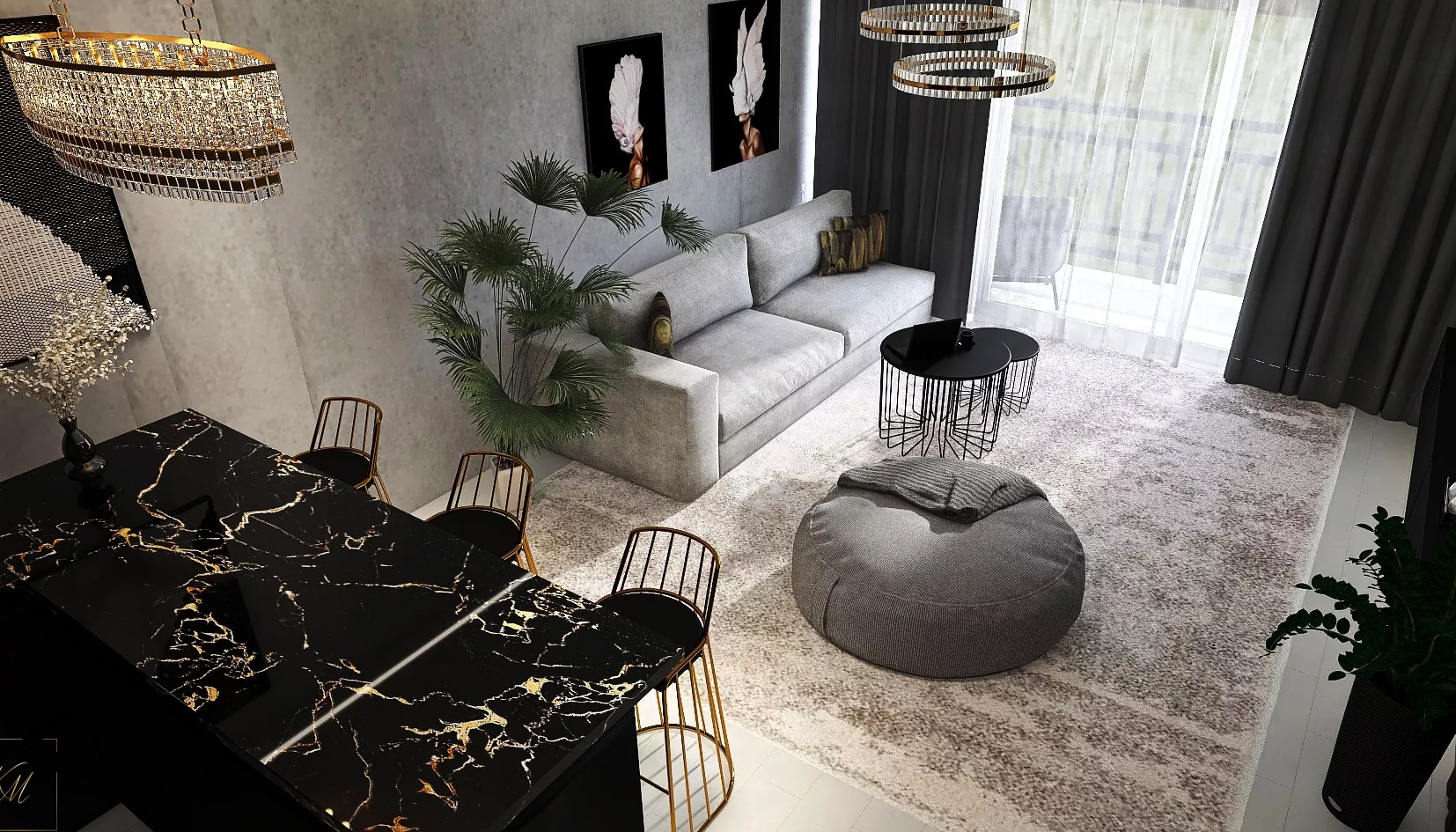 Widok z góry na salon z czarnym blatem z marmurowym wzorem, szarą sofą, pufą i roślinami doniczkowymi; nad blatem wisi kryształowy żyrandol.