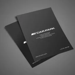 Dwie czarne wizytówki z białym logo i tekstem na szarym tle, prezentujące studio detailingowe, pomoc drogową, wynajem samochodów sportowych i myjnię samochodową.