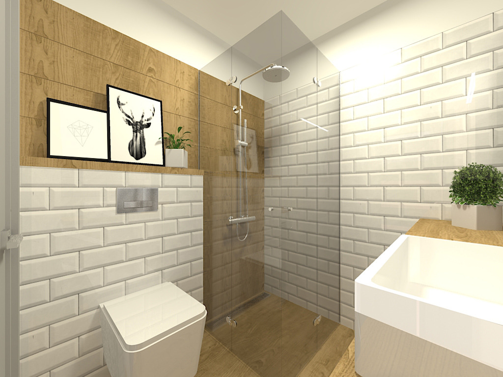 Nowoczesna łazienka z drewnianą ścianą, białymi płytkami typu metro, kabiną prysznicową ze szkła, wiszącą toaletą i umywalką nablatową, dekorowana grafikami w czarnych ramkach i rośliną w doniczce.