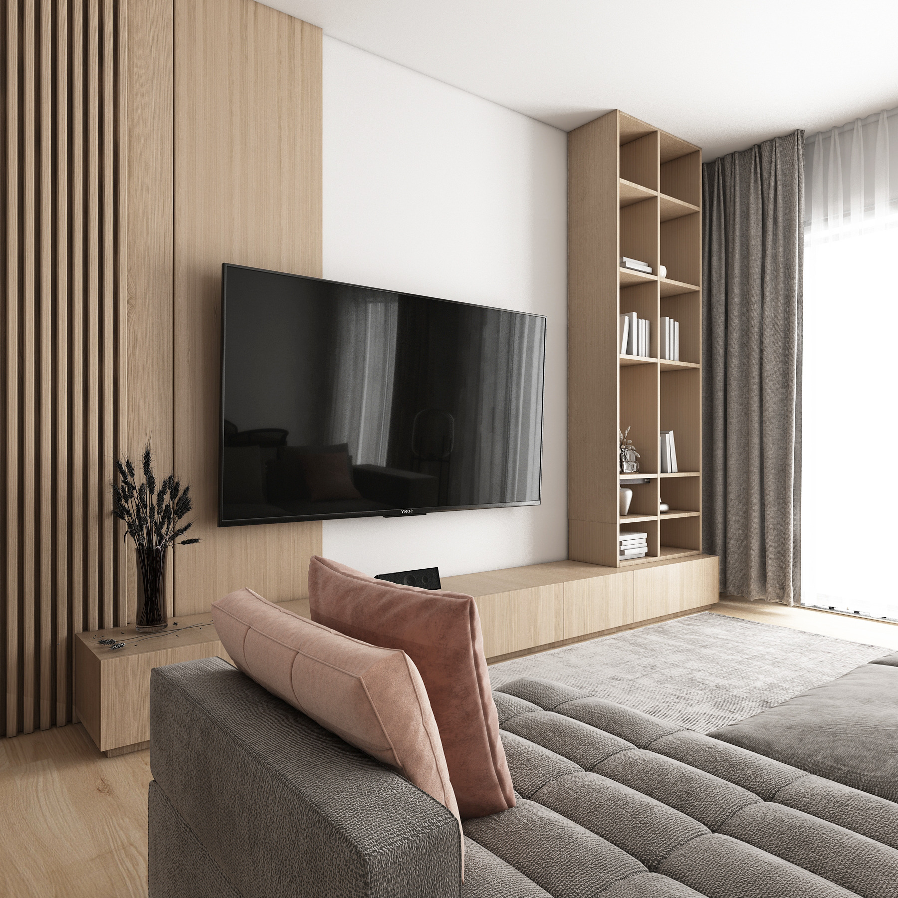 Nowoczesny salon z drewnianą ścianą z lamelami, telewizorem, regałem na książki i szarym narożnikiem z różowymi poduszkami.