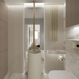 Maleńka łazienka z pralka i suszarką w zabudowie.