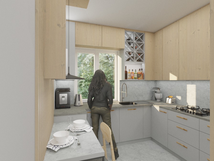 Jasna kuchnia w stylu skandynawskim z drewnianymi szafkami i marmurowym blatem. Widoczna kobieta w tle, okno z zielenią i dekoracyjna półka na wino.
