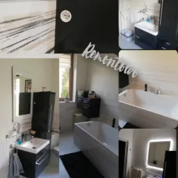 Nowoczesna aranżacja łazienki po remoncie w Chodzieży: biała wanna, umywalka z szafką w kolorze antracytowym, lustro z podświetleniem LED i płytki imitujące marmur.