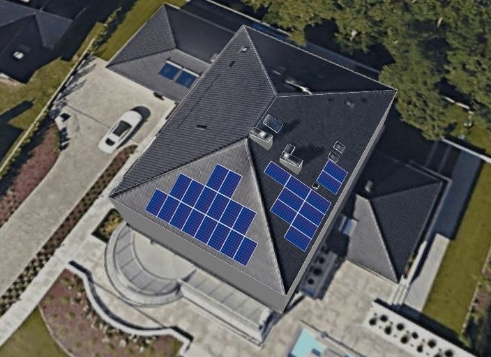 Widok z lotu ptaka na dom z panelami słonecznymi na dachu, biały samochód zaparkowany na podjeździe.