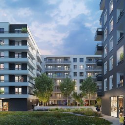 Izumrud Bud-Invest Sp. z o.o. - Kompleks nowoczesnych budynków wielorodzinnych z balkonami, widok na dziedziniec z zielenią, placem zabaw i spacerującymi ludźmi, elewacja w kolorach bieli i grafitu.