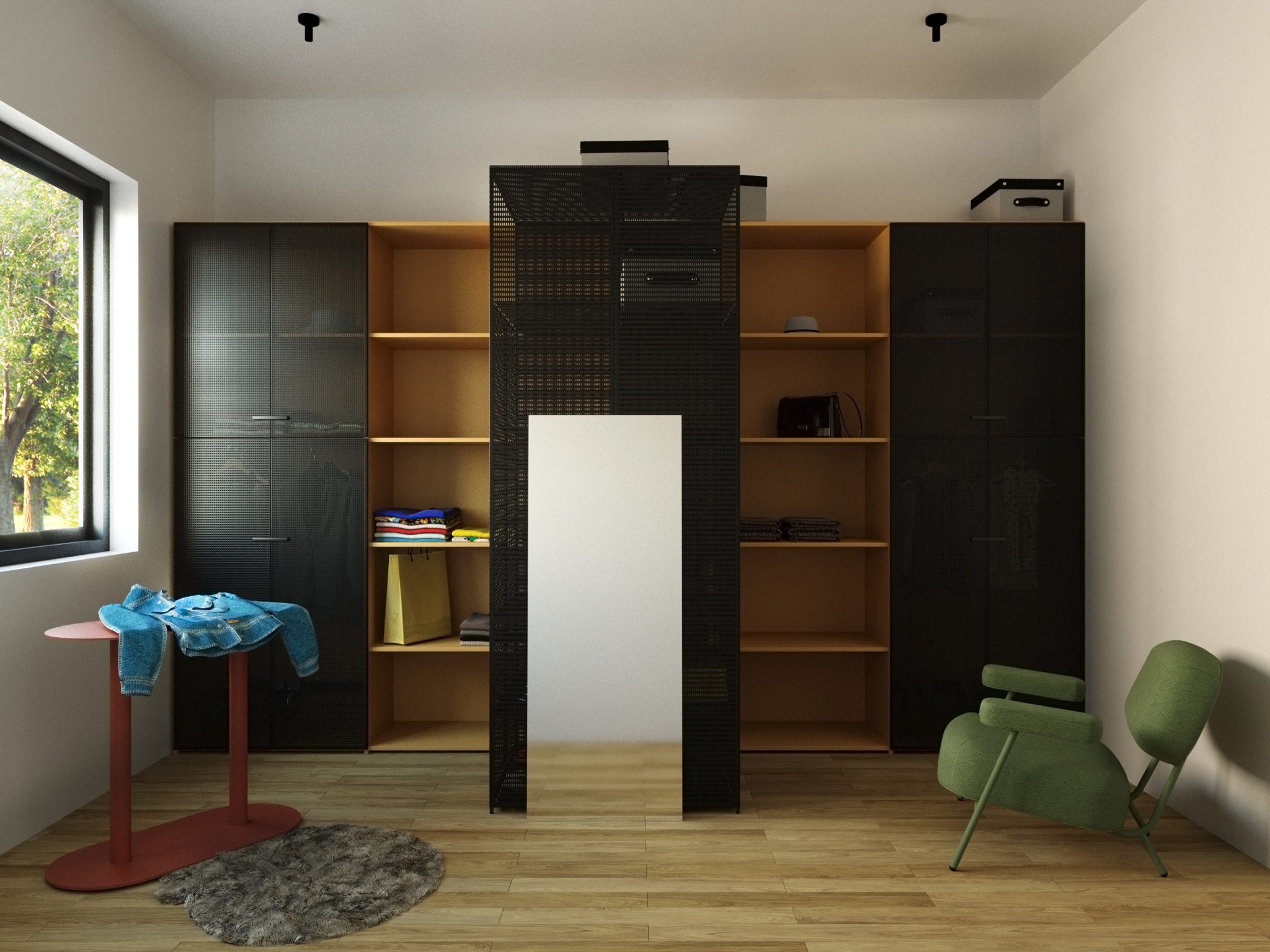 Wnętrze garderoby z czarnymi szafami, otwartymi półkami z ubraniami i akcesoriami, lustrem w metalowej ramie, zielonym krzesłem i dżinsową kurtką leżącą na okrągłym stoliku.