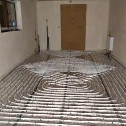 Wykonanie instalacji wód kan i ogrzewanie podłogowe z materiałem.Domek 120m²