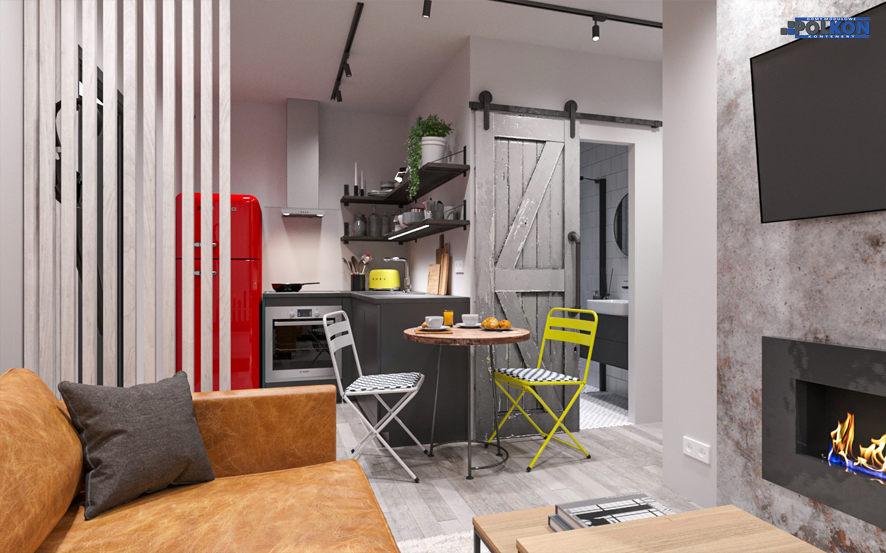 Wnętrze małego mieszkania z aneksem kuchennym, czerwona lodówka Smeg, stół z dwoma krzesłami, przesuwne drzwi do łazienki w stylu rustykalnym, kominek elektryczny pod telewizorem.