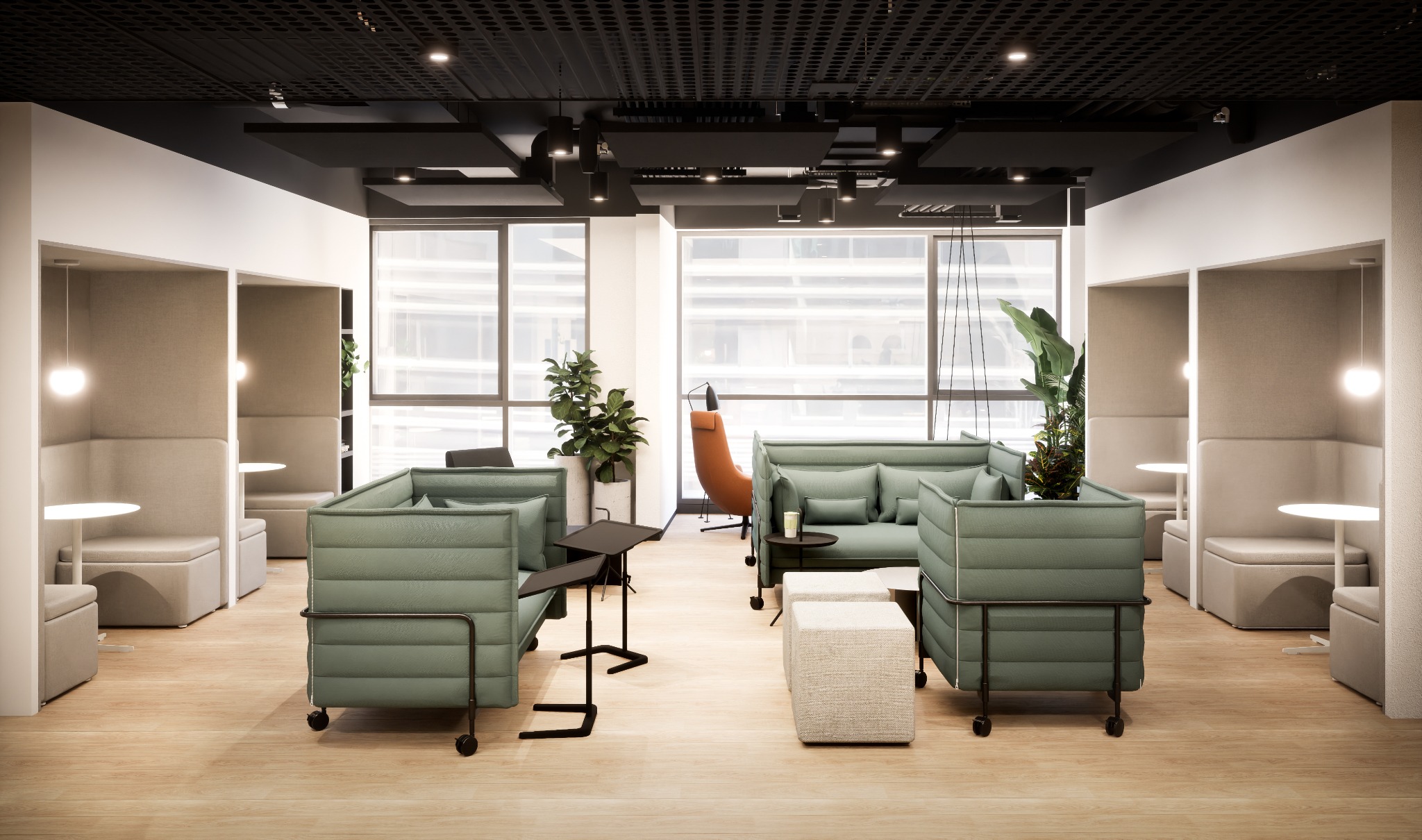 Nowoczesna aranżacja biura z zielonymi sofami na kółkach, stolikami i kabinami do pracy w skupieniu. Jasne drewno na podłodze i duże okna w tle.