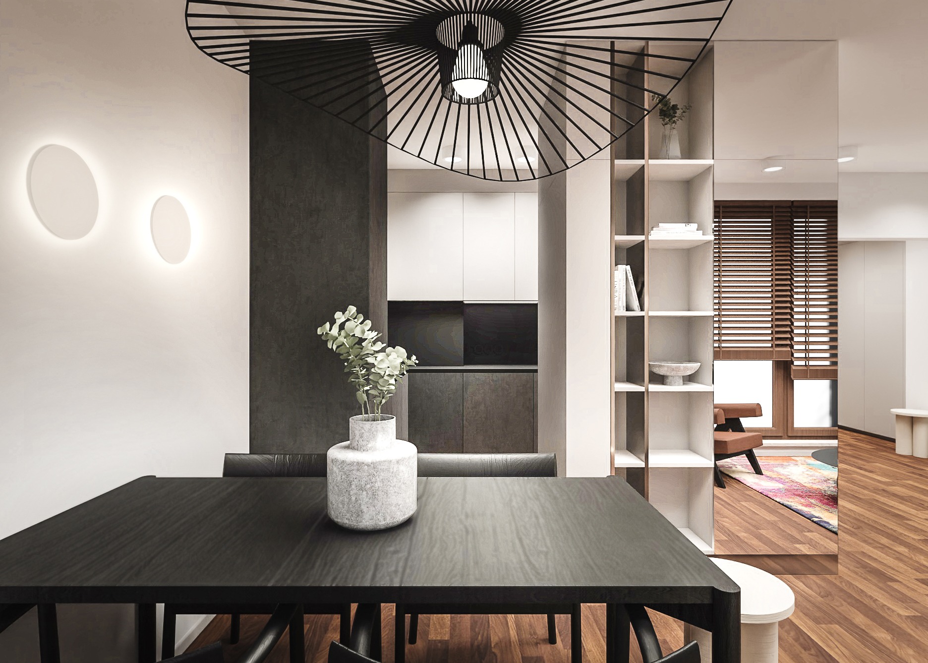 Nowoczesna jadalnia z czarnym stołem, designerską lampą i dekoracyjnym regałem. W tle widoczna kuchnia i salon, tworzące spójną przestrzeń.