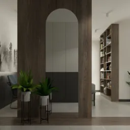 Nowoczesne wnętrze z drewnianą zabudową: minimalistyczna szafa z łukowym otworem, rośliny doniczkowe na metalowych stojakach, ściana z grafiką w stylu tuszu, regał z książkami w tle.