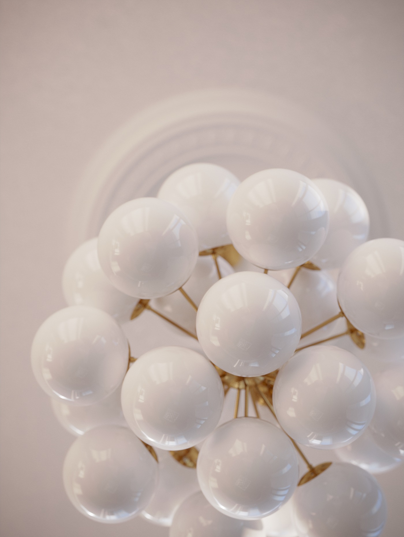 Lampa sufitowa w stylu modern z kulistymi, białymi kloszami i złotymi elementami mocującymi, widok od dołu, z dekoracyjnym sztukaterią na suficie w tle.