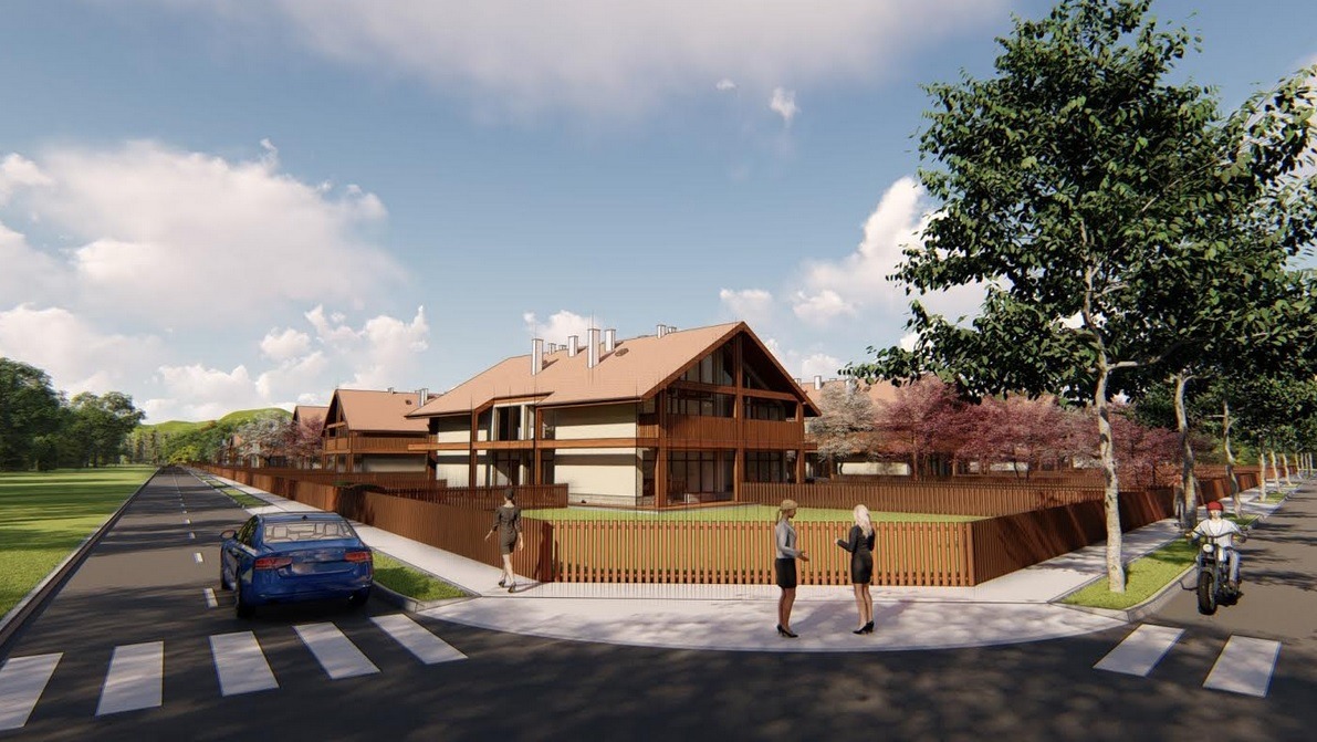 Wizualizacja osiedla domów jednorodzinnych z brązowymi dachami i drewnianymi ogrodzeniami, widok z ulicy z przejściem dla pieszych, samochodem i osobami na chodniku.