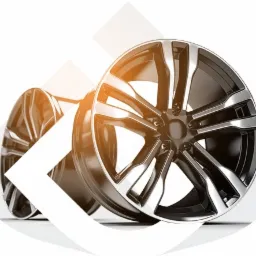 Dwie felgi aluminiowe z czarnym środkiem i srebrnymi ramionami, wykończone na wysoki połysk, na białym tle z geometrycznymi elementami.