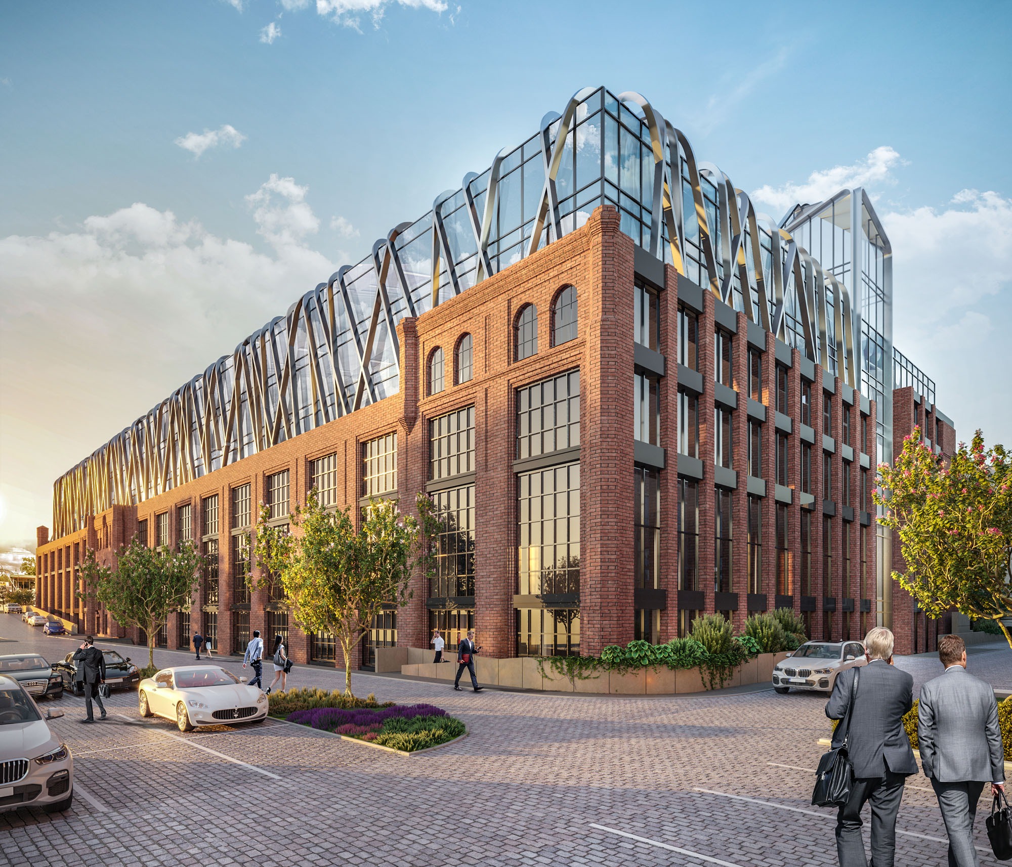 Wizualizacja zewnętrzna budynku usługowego z cegły z nowoczesną, przeszkloną nadbudową, otoczonego parkingiem i zielenią miejską, w tle zachodzące słońce.