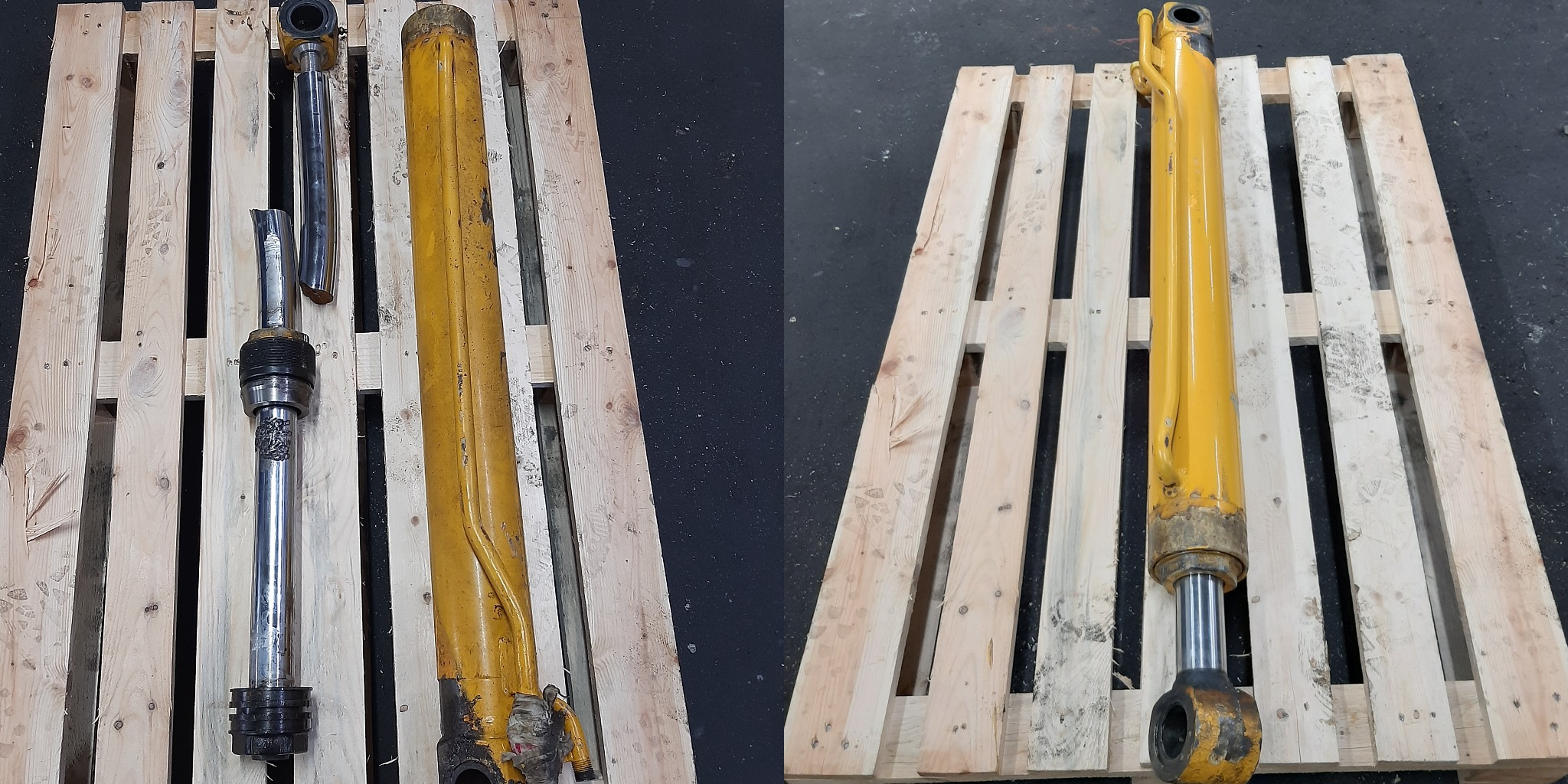 Dwa cylindry hydrauliczne na drewnianej palecie: jeden złożony, z żółtą obudową i chromowanym tłokiem, drugi rozłożony, z uszkodzonym tłokiem i żółtą obudową.