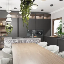 Nowoczesna kuchnia z szarymi szafkami, marmurowym blatem wyspy, drewnianym stołem i białymi krzesłami, oświetlona wiszącymi lampami kulami i roślinami zwisającymi z sufitu.