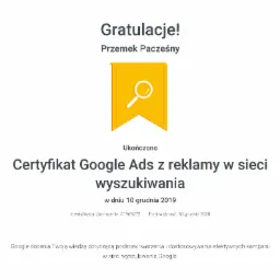 Certyfikat Google Ads z reklamy w sieci wyszukiwania dla Przemka Pacześnego, ukończony 10 grudnia 2019, z żółtym symbolem lupy na żółtym tle.