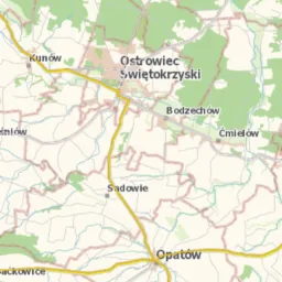 Mapa okolic Ostrowca Świętokrzyskiego z zaznaczonymi miejscowościami i drogami, w neutralnej kolorystyce.