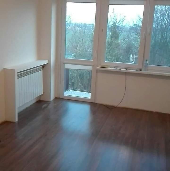 Gładzie, panele, zabudowa grzejnika.