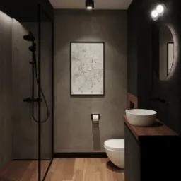 Nowoczesna łazienka w odcieniach szarości i czerni z drewnianą podłogą, kabiną prysznicową typu walk-in i umywalką nablatową na blacie z ciemnego drewna. Na ścianie wisi mapa Łodzi w czarnej ramie.