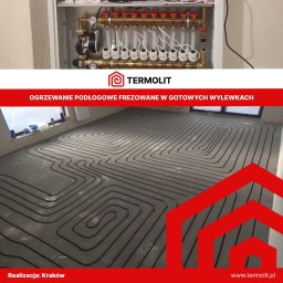 Termolit - Rozdzielacz ogrzewania podłogowego w szafce natynkowej oraz frezowane rowki w gotowej wylewce pod rury ogrzewania podłogowego.