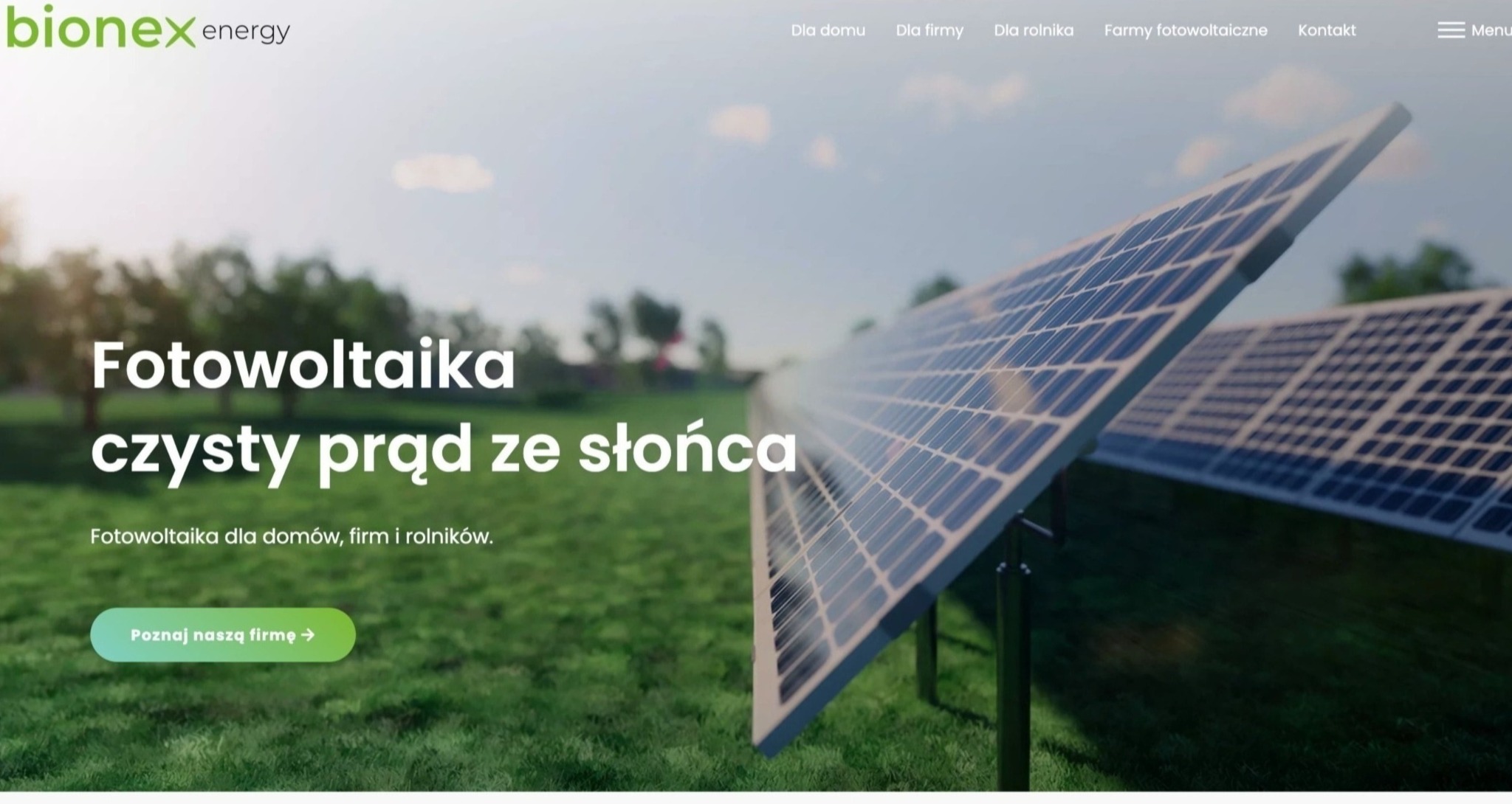 Strona internetowa firmy Bionex Energy prezentująca panele fotowoltaiczne na tle zielonego trawnika i drzew. Widoczne menu nawigacyjne i hasło 'Fotowoltaika czysty prąd ze słońca'.