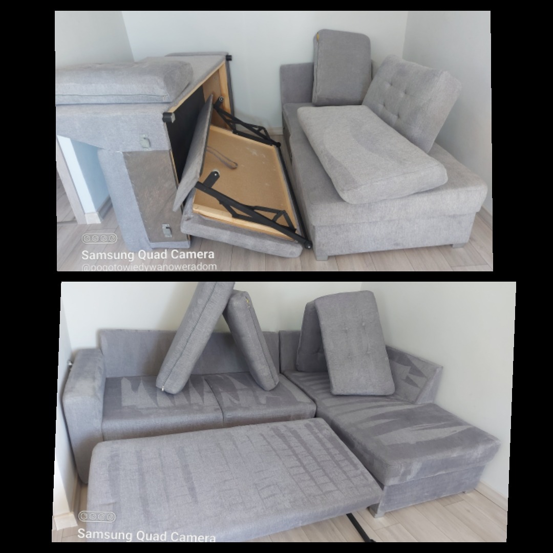 Szara, rozłożona sofa modułowa z widocznymi plamami po czyszczeniu, poduszki ułożone na siedzisku, elementy konstrukcyjne na podłodze.