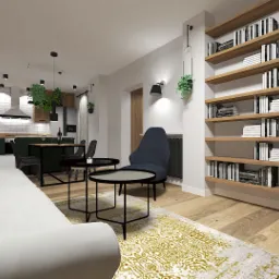 Wizualizacja przestronnego wnętrza mieszkania z otwartą kuchnią, białym narożnikiem z żółtą poduszką, okrągłymi stolikami kawowymi, ciemnozieloną zabudową kuchenną i regałem na książki.