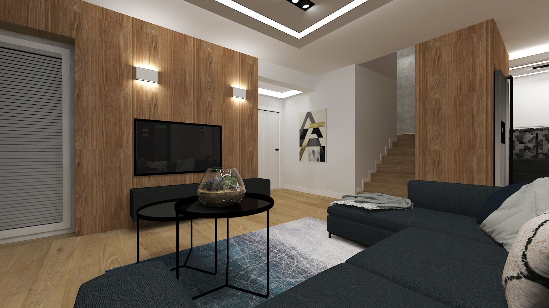 Wizualizacja salonu z drewnianą ścianą, telewizorem, czarnymi stolikami, szarą sofą narożną i dywanem w odcieniach błękitu i szarości. Na stoliku szklana misa z sukulentami. Widoczne schody...